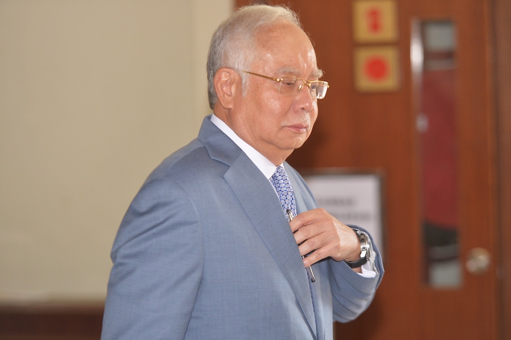 Former prime minister Datuk Seri Najib Razak leaves the Kuala Lumpur High Court December 19, 2019. u00e2u20acu201d Picture by Shafwan Zaidon