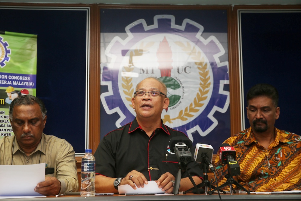 (From left) MTUC vice-president (private sector) R. Jey Kumar, president Datuk Abdul Halim Mansor and secretary-general J. Solomon attend a press conference in Subang Jaya December 26, 2019. u00e2u20acu201d Picture by Choo Choy May
