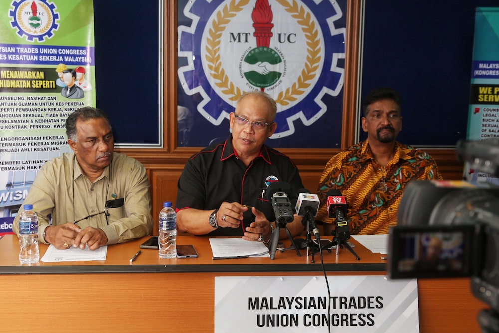 (From left) MTUC vice-president (private sector) R. Jey Kumar, president Datuk Abdul Halim Mansor and secretary-general J. Solomon attend a press conference in Subang Jaya December 26, 2019. u00e2u20acu201d Picture by Choo Choy May