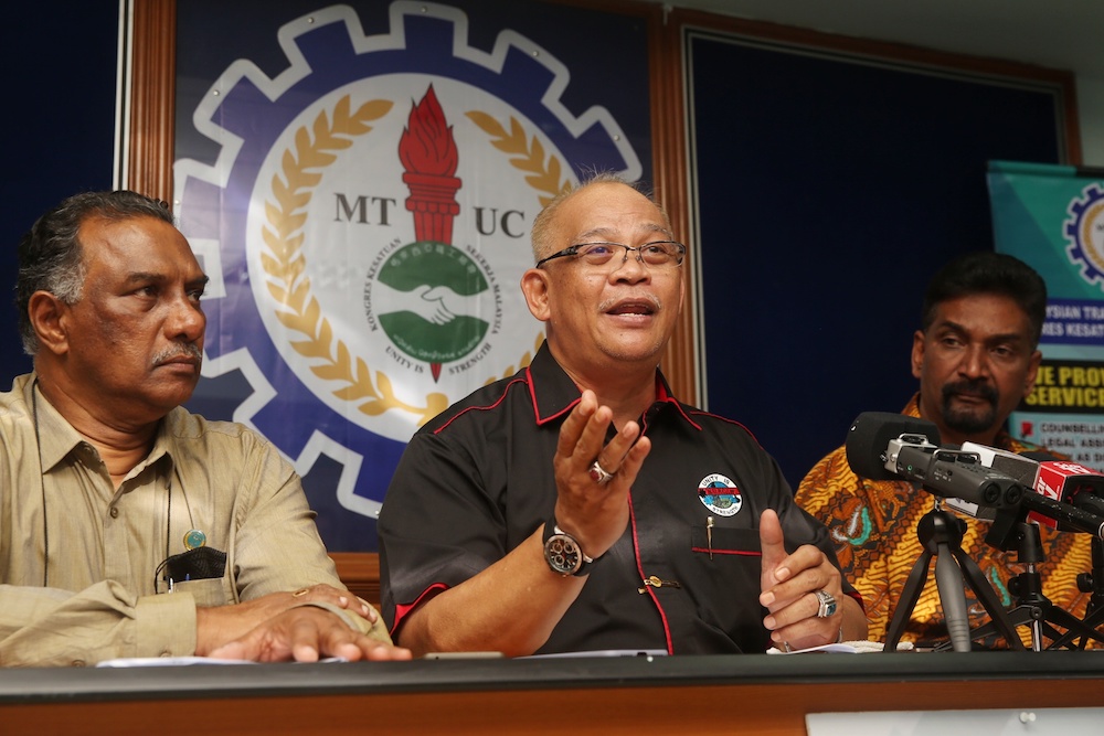 (From left) MTUC vice-president (private sector) R. Jey Kumar, president Datuk Abdul Halim Mansor and secretary-general J. Solomon attend a press conference in Subang Jaya December 26, 2019. u00e2u20acu201d Picture by Choo Choy May