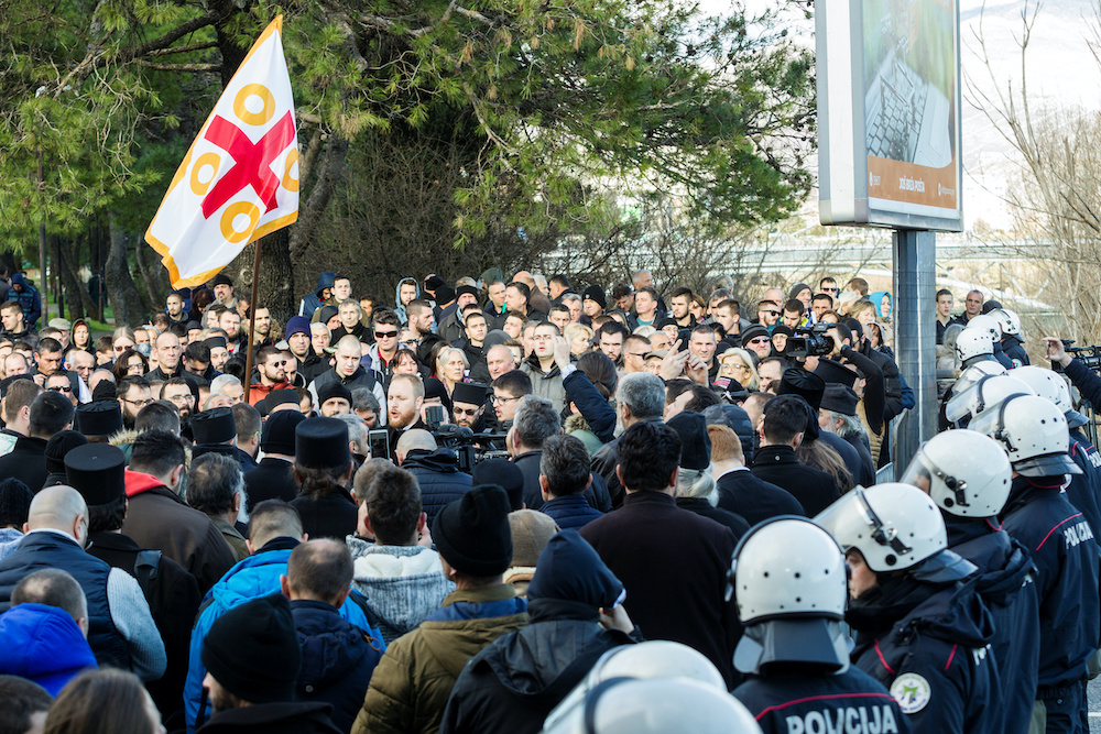 Serbian Orthodox Church clergy and believers hold a service on a bridge near the parliament  in Podgorica, Montenegro December 26, 2019. u00e2u20acu201d Reuters pic