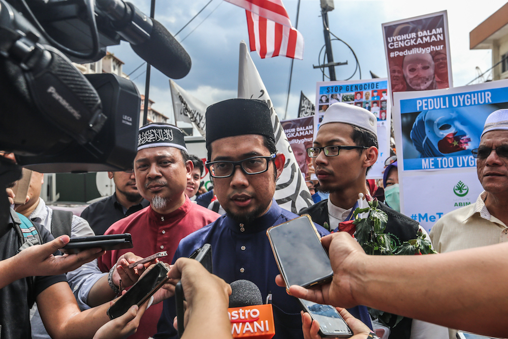 Abim president Muhammad Faisal Abdul Aziz speaks to reporters during a protest held in solidarity with China’s Uighur Muslims in Kuala Lumpur December 27, 2019. — Picture by Firdaus Latif