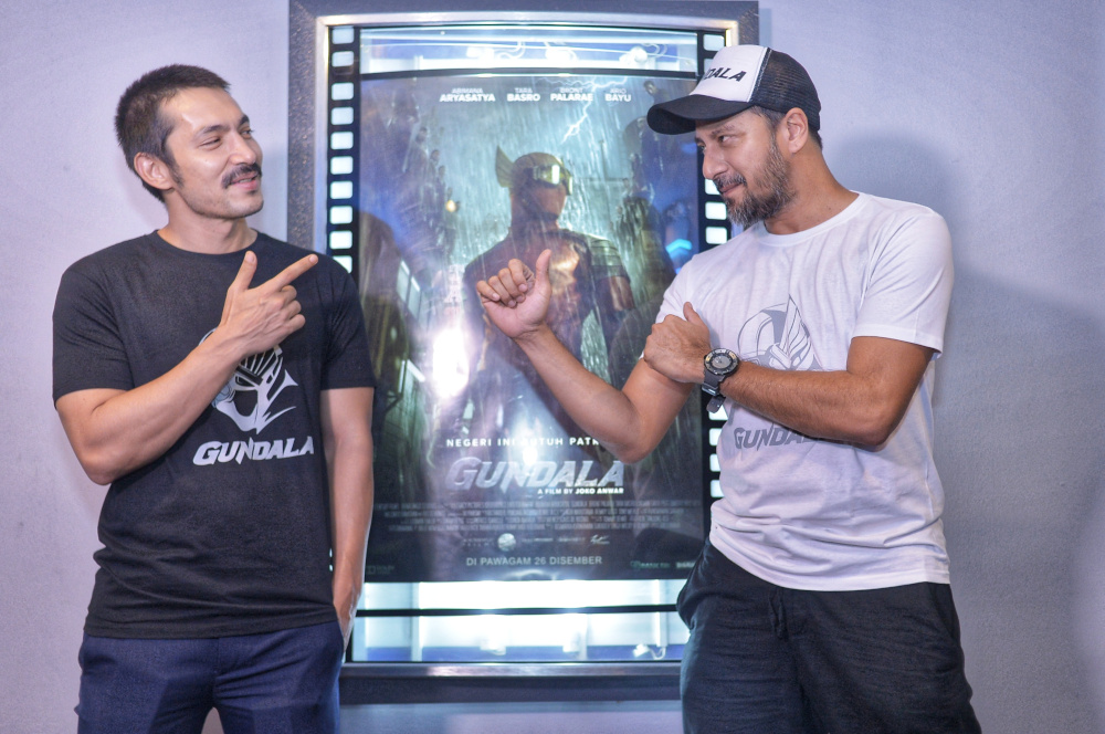 Abimana Aryasatya (left) stars as Sancaka while Malaysian actor Bront Palarae plays Pengkor, a disfigured crime boss bent on revenge. — Picture by Shafwan Zaidon