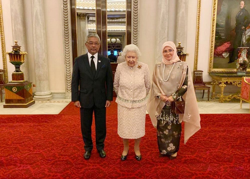 Yang di-Pertuan Agong Al-Sultan Abdullah Riu00e2u20acu2122ayatuddin Al-Mustafa Billah Shah and Raja Permaisuri Agong Tunku Hajah Azizah Aminah Maimunah attend a luncheon with Queen Elizabeth II at Buckingham Palace, December 12, 2019. u00e2u20acu201d Bernama pic