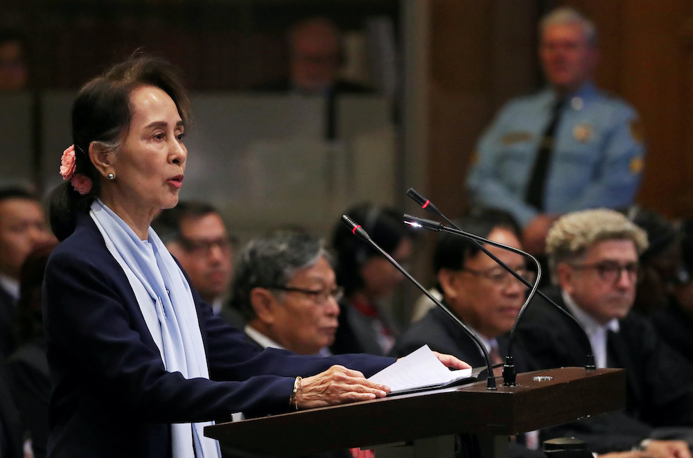 Myanmaru00e2u20acu2122s leader Aung San Suu Kyi speaks on the second day of hearings in a case filed by Gambia against Myanmar alleging genocide against the minority Muslim Rohingya population, at the International Court of Justice in The Hague, Netherlands December 