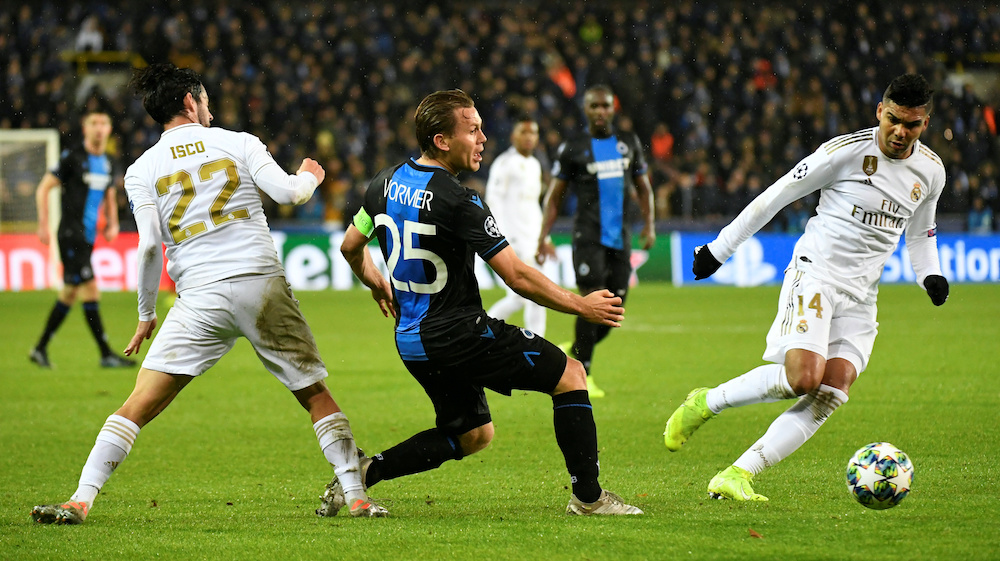 File photo of Real Madridu00e2u20acu2122s Casemiro in action with Club Bruggeu00e2u20acu2122s Ruud Vormerin in Jan Breydel Stadium, Bruges, Belgium, December 11, 2019. u00e2u20acu201d Reuters pic