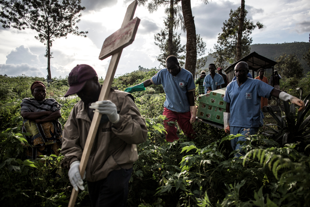Health workers carry a coffin containing a victim of Ebola virus May 16, 2019 in Butembo, Congo. u00e2u20acu201d AFP pic 
