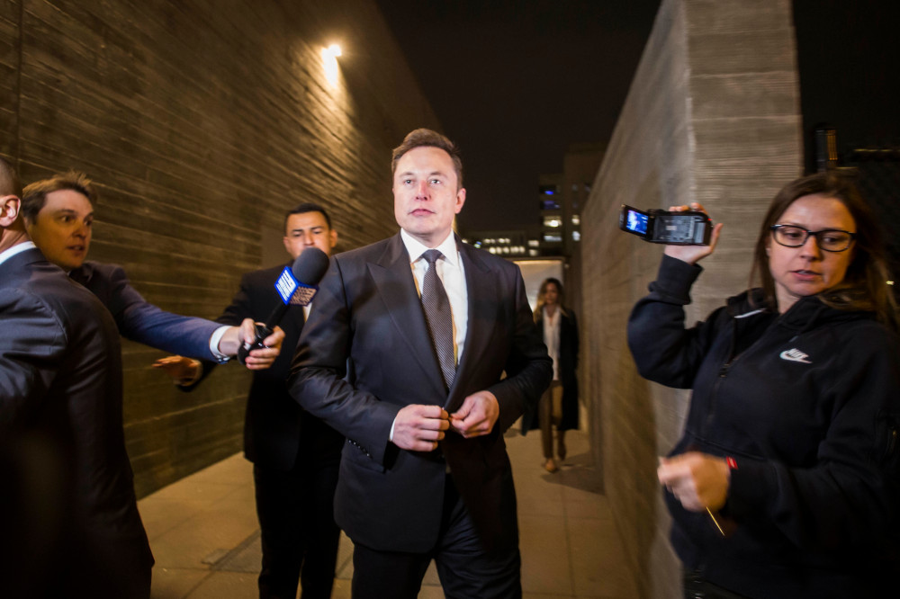 Elon Musk leaves the US District Court, Central District of California through a back door in Los Angeles December 3, 2019 u00e2u20acu201d Apu Gomes/Getty Images/AFP pic