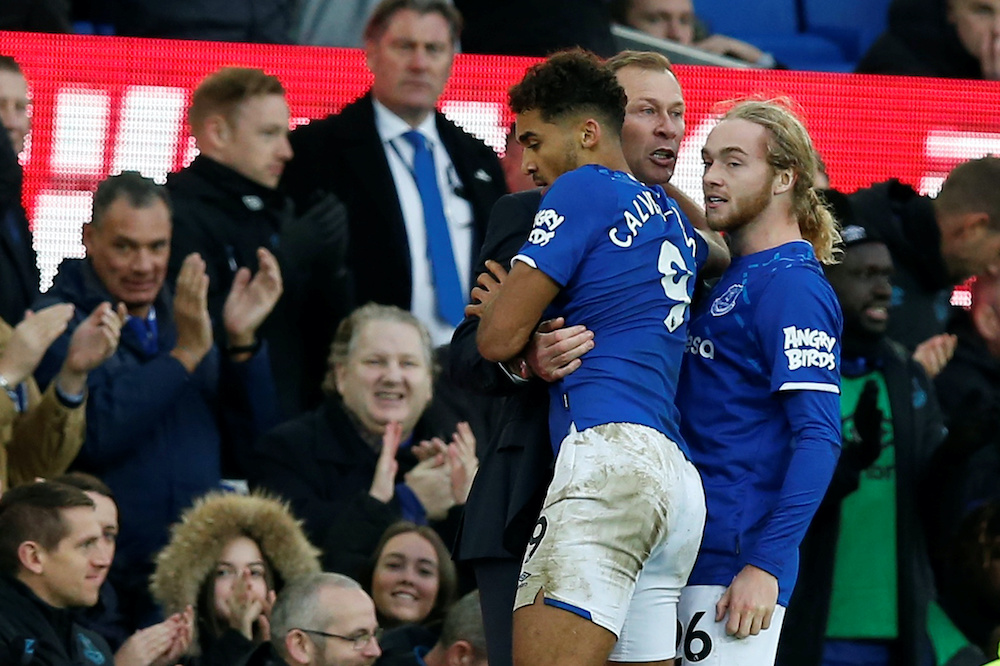 Evertonu00e2u20acu2122s Dominic Calvert-Lewin celebrates scoring their third goal with interim manager Duncan Ferguson against Chelsea at Goodison Park in Liverpool, December 7, 2019. u00e2u20acu201d Reuters picnn
