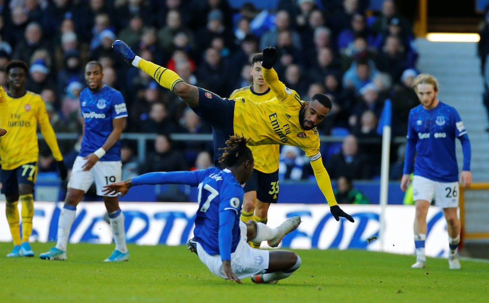 Evertonu00e2u20acu2122s Moise Kean in action with Arsenalu00e2u20acu2122s Alexandre Lacazette during their match in Goodison Park, Liverpool, December 21, 2019. u00e2u20acu2022 Reuters picnnnn