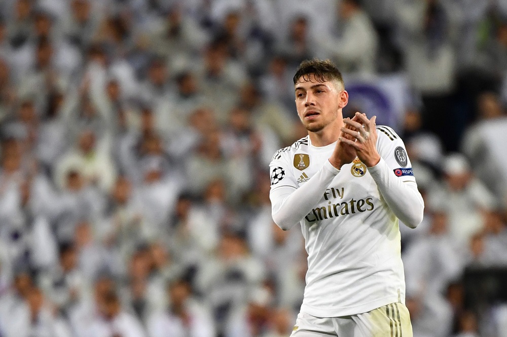 Real Madridu00e2u20acu2122s Uruguayan midfielder Federico Valverde applauds during the Uefa Champions League Group A match against Paris Saint-Germain FC at the Santiago Bernabeu stadium in Madrid November 26, 2019. u00e2u20acu201d AFP pic