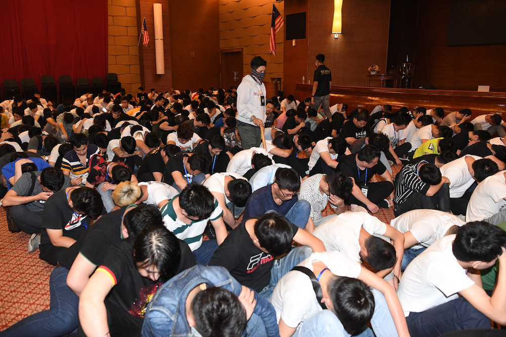 Some of the 680 Chinese nationals who were arrested by the Immigration Department in Cyberjaya November 20, 2019, following a crackdown on an online scam syndicate. u00e2u20acu201d Bernama pic