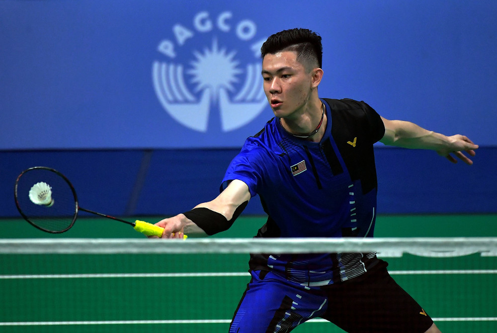 Malaysiau00e2u20acu2122s Lee Zii Jia in action against Indonesiau00e2u20acu2122s Jonathan Christie in the badminton event at the 2019 SEA Games December 4, 2019.  u00e2u20acu201d Bernama pic