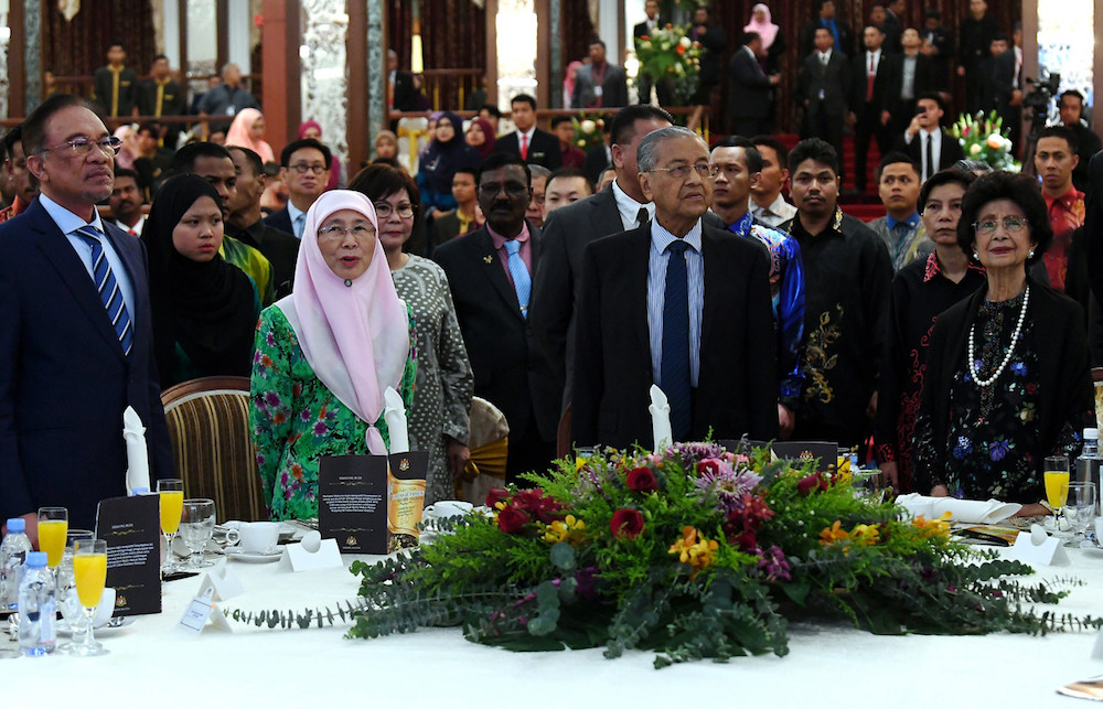 Datuk Seri Anwar Ibrahim, Datuk Seri Dr Wan Azizah Wan Ismail, Tun Dr Mahathir Mohamad and Tun Dr Siti Hasmah Mohamad Ali attend a dinner for the 60th anniversary of Parliament in Kuala Lumpur December 4, 2019. u00e2u20acu201d Bernama pic
