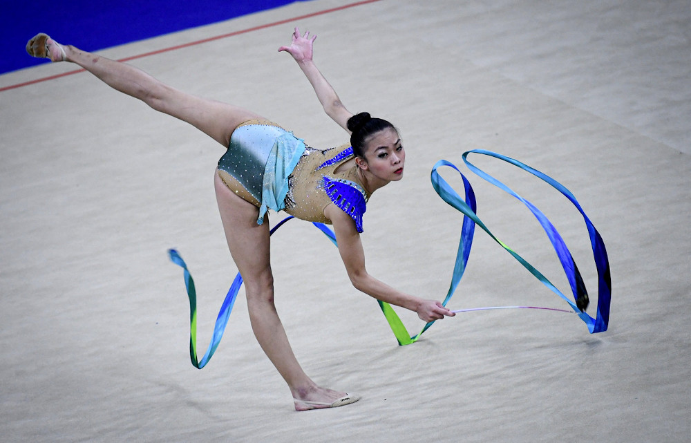 Malaysian gymnast Amy Kwan Dict Weng in action during the ribbon event at the 2019 SEA Games in Manila December 6, 2019. u00e2u20acu201d Bernama pic