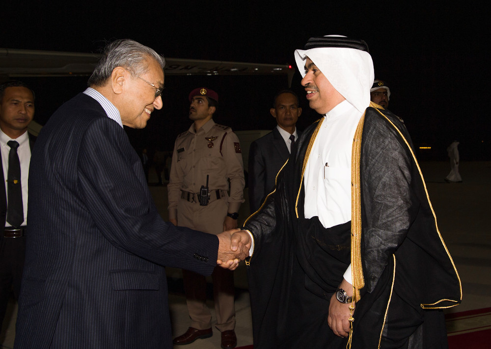 Prime Minister Tun Dr Mahathir Mohamad was greeted by Qataru00e2u20acu2122s Minister of Commerce and Industry, Ali bin Ahmed Al Kuwari upon arrival at the Hamad International Airport in Doha December 12, 2019. u00e2u20acu201d Bernama pic