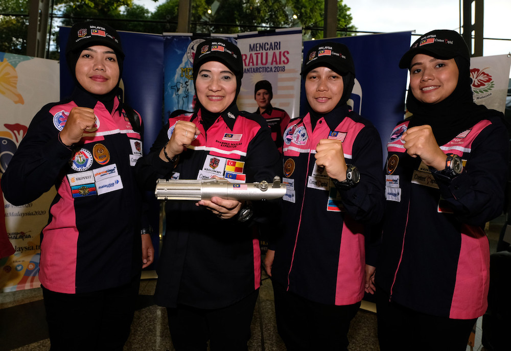 All Women Expedition to Antarctica mentor Sharifah Mazlina Syed Abdul Kadir (2nd left) with Siti Jumaidah Bensali, Salehah Abu Nor and Nurul Atiqah Tamarun during the flagging off ceremony at KLIA in Sepang December 12, 2019. u00e2u20acu201d Bernama pic