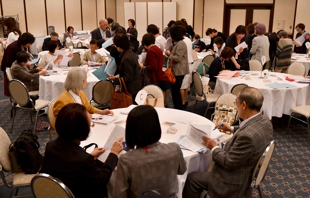 This photo taken on November 3, 2019 shows a general view of parents and participants looking over information as they take part in a match-making party in Tokyo. u00e2u20acu201d AFP pic 