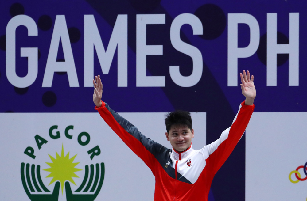 Gold medallist Joseph Isaac Schooling of Singapore celebrates after the menu00e2u20acu2122s 100m butterfly at the New Clark City Aquatic Center, Capas, Philippines, December 6, 2019. u00e2u20acu201d Reuters pic   