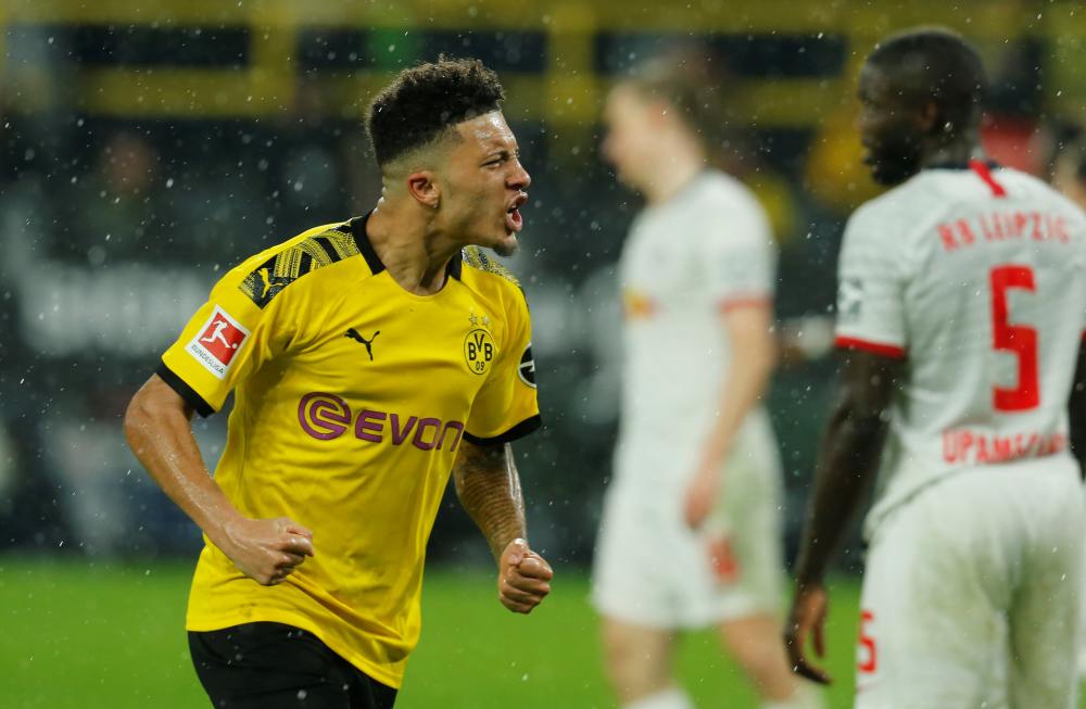Borussia Dortmund's Jadon Sancho celebrates after scoring the third goal against RB Leipzig December 17, 2019. u00e2u20acu2022 Reuters pic