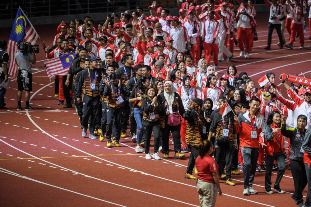 The Malaysian contingent parading at the New Clark City Athletics Stadium as the 30th SEA Games in the Philippines drew to a close December 11, 2019. u00e2u20acu201d Bernama pic 