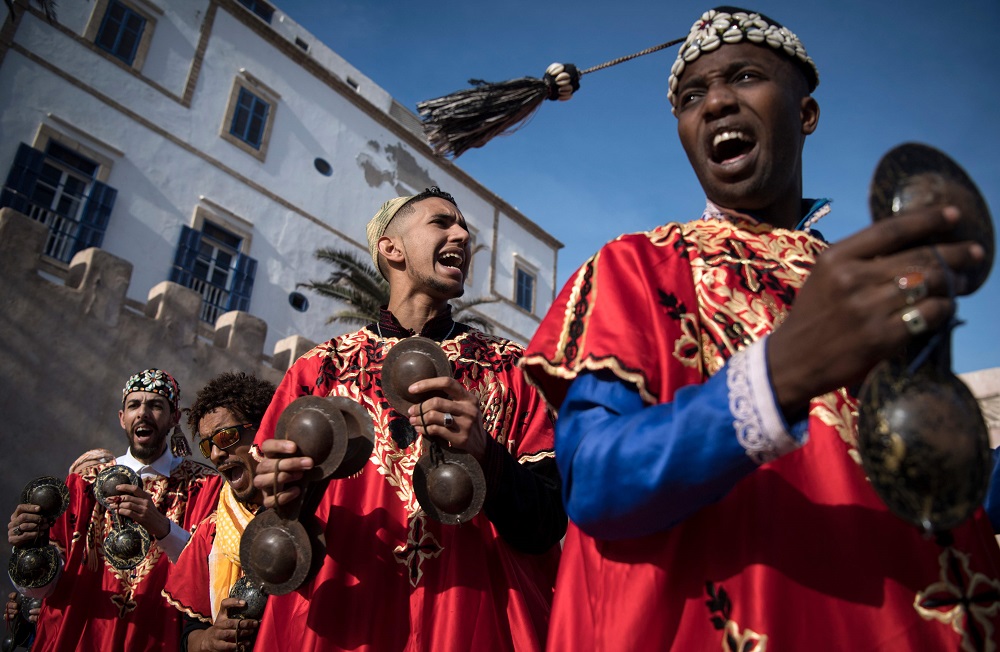 A Gnawa traditional group performs in the city of Essaouira on December 14, 2019, to celebrate the decision of adding the Gnawa culture to Unesco’s list of Intangible Cultural Heritage of Humanity. — AFP pic 