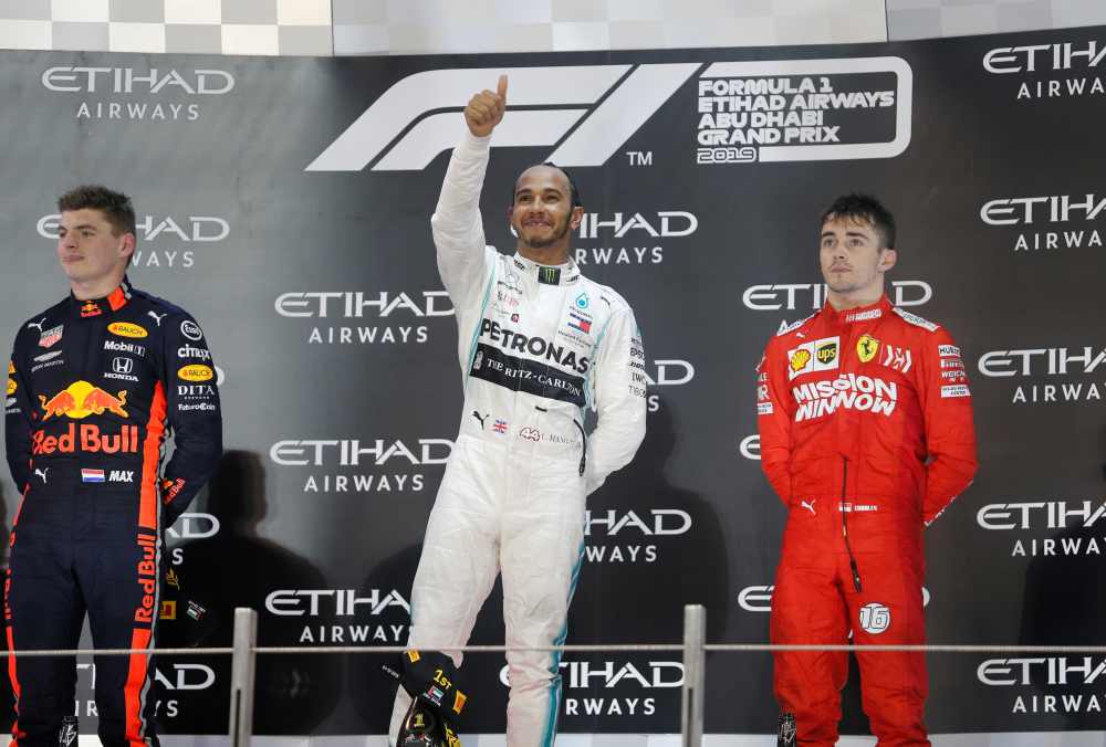 Mercedes' Lewis Hamilton celebrates after winning the race with second placed Red Bull's Max Verstappen and third placed Ferrari's Charles Leclerc in Abu Dhabi December 1, 2019. u00e2u20acu2022 Reuters pic