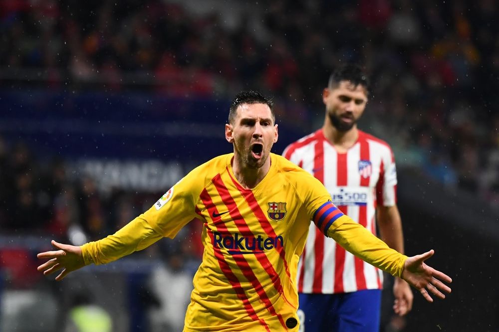 Barcelonau00e2u20acu2122s Argentine forward Lionel Messi celebrates after scoring during the Spanish league football match between Club Atletico de Madrid and FC Barcelona at the Wanda Metropolitano stadium in Madrid, December 1, 2019. u00e2u20acu201d AFP pic