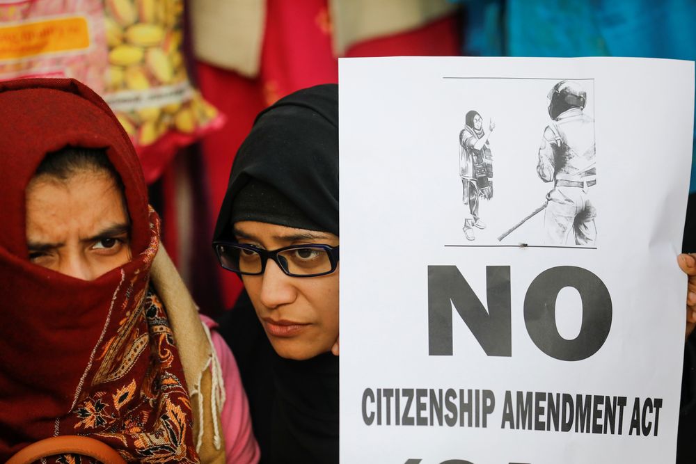 A demonstrator holds a poster during a protest against a new citizenship law, outside the Jamia Millia Islamia University in New Delhi, India, December 18, 2019. u00e2u20acu201d Reuters pic