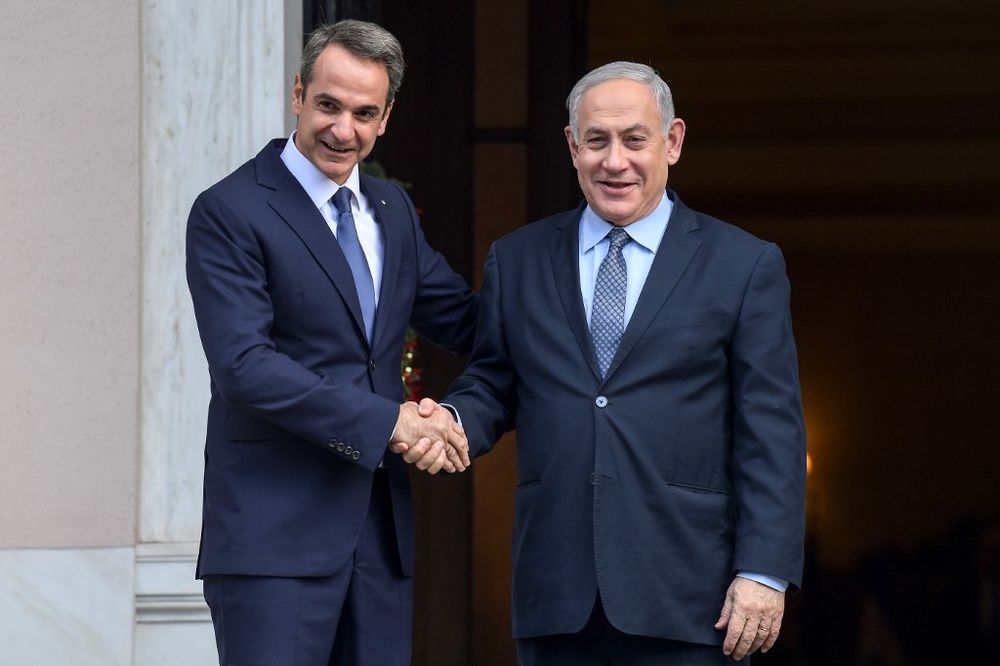 Greek Prime Minister Kyriakos Mitsotakis (left) shakes hands with his Israeli counterpart Benjamin Netanyahu before their meeting in Athens on January 2, 2020. u00e2u20acu201d AFP pic