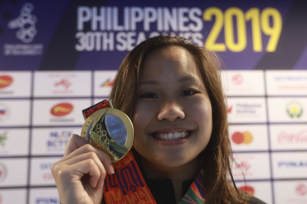 Phee Jinq En is all smiles after winning gold in the 50-metre breaststroke event December 6, 2019. u00e2u20acu2022 Bernama pic