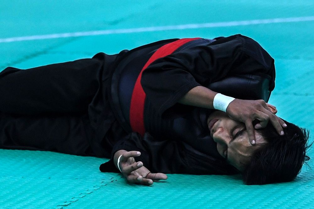 National silat athlete Muhammad Faizul Nasir was injured in a match against the Philippinesu00e2u20acu2122 Dines Dumaan in the Class B Silat match at the 2019 SEA Games at the Subic Bay Convention Center, December 3, 2019. u00e2u20acu201d Bernama pic