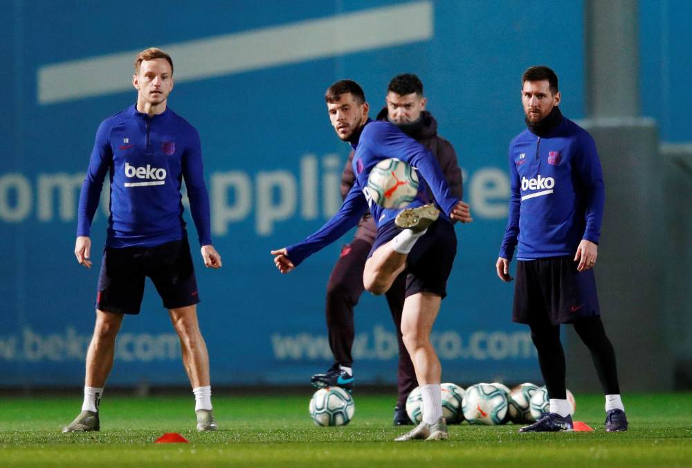 Barcelona's Ivan Rakitic, Carles Perez and Lionel Messi during a training session ahead of the Clasico, December 18, 2019. u00e2u20acu2022 Reuters pic