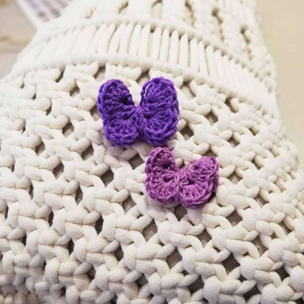 Purple butterflies knitted as a call to end domestic violence are pictured in this handout photo. u00e2u20acu201d Reuters pic