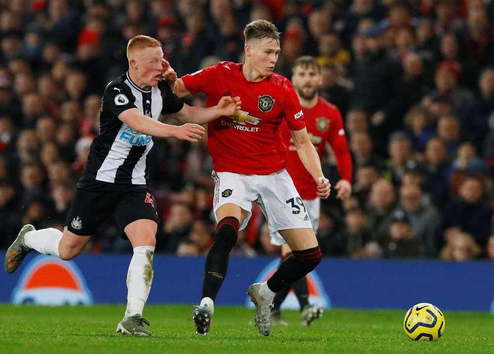 Manchester United's Scott McTominay in action with Newcastle United's Matthew Longstaff, December 27, 2019. u00e2u20acu2022 Reuters pic