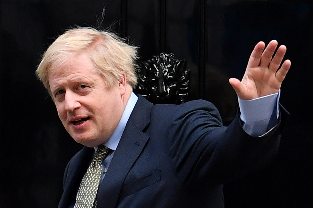 Britainu00e2u20acu2122s Prime Minister and Conservative Party leader Boris Johnson arrives at 10 Downing Street in central London December 13, 2019, following an audience with Britainu00e2u20acu2122s Queen Elizabeth II at Buckingham Palace. u00e2u20acu201d AFP pic 