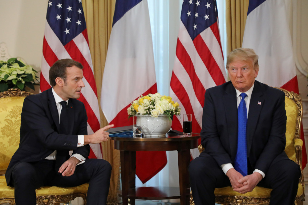 US President Donald Trump and Franceu00e2u20acu2122s President Emmanuel Macron react as they talk during their meeting at Winfield House, London on December 3, 2019. u00e2u20acu201d AFP pic 