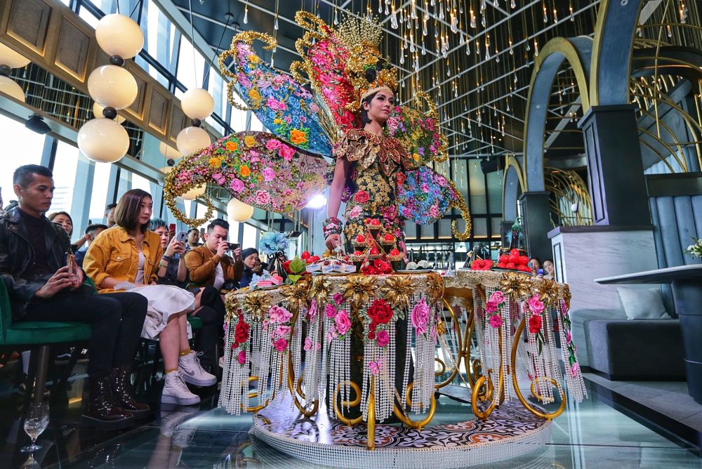 Miss Universe Malaysia 2019 Shweta Sekhon wears u00e2u20acu02dcA Peranakan Indulgenceu00e2u20acu2122 during a press preview last month in Kuala Lumpur. u00e2u20acu201d Picture by Ahmad Zamzahuri