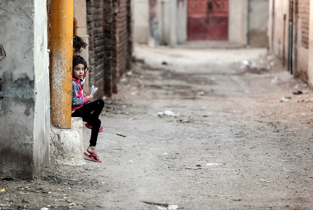 Egyptian children sit on the side of an alley in the village of al-Nehaya, one of the countryu00e2u20acu2122s poorest, in the province of Assiut in central Egypt, November 16, 2019. u00e2u20acu201d AFP pic 