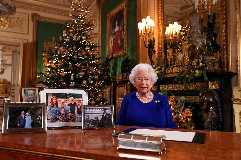 Britain's Queen Elizabeth poses, after recording her annual Christmas Day message in Windsor Castle, in Berkshire, Britain, in this undated picture December 24, 2019. u00e2u20acu201d Steve Parsons/Pool pic via Reuters