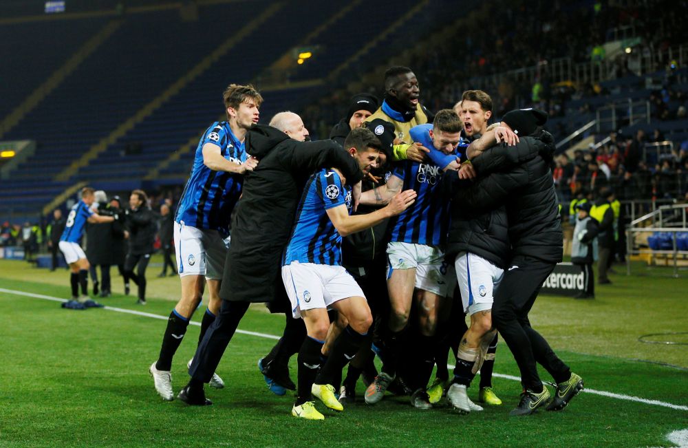 Atalanta's Robin Gosens celebrates scoring their third goal against Shakhtar Donetsk with teammates. u00e2u20acu201d Reuters pic