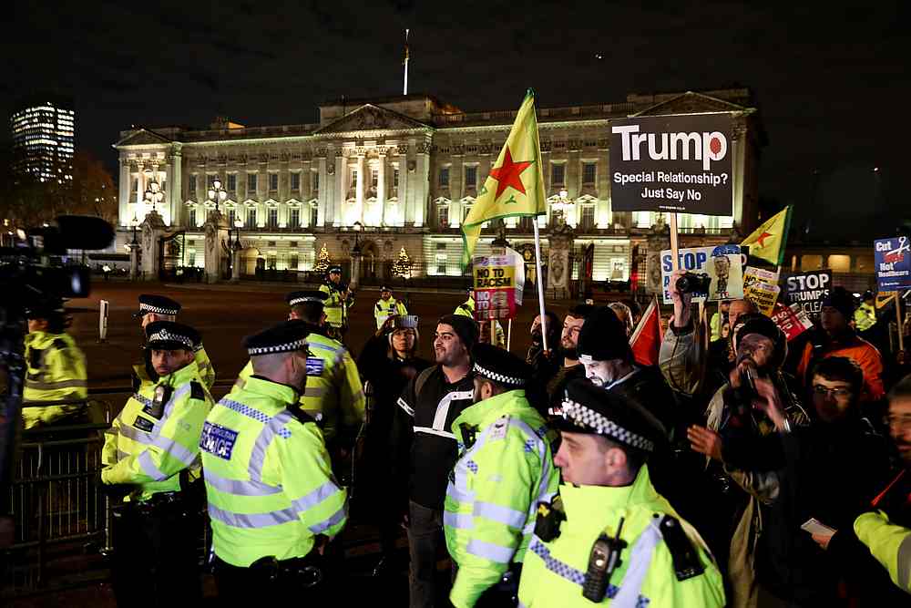 Anti-Trump protestors outside Buckingham Palace ahead of the Nato summit in London, Britain December 3, 2019. u00e2u20acu201d Reuters pic 