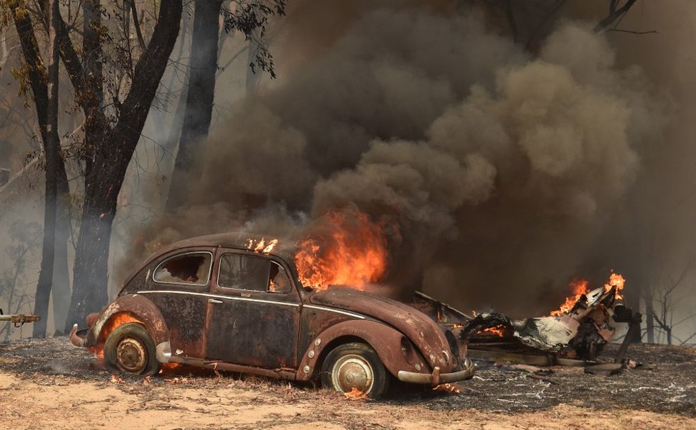 An old car burns from bushfires in Balmoral, 150 kilometres southwest of Sydney on December 19, 2019. A state of emergency was declared in Australiau00e2u20acu2122s most populated region as a record heat wave fanned unprecedented bushfires. u00e2u20acu201d AFP pic