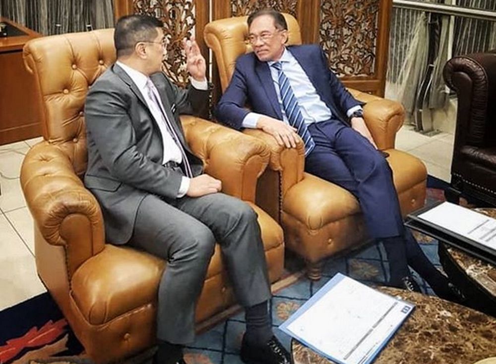 Azmin uploaded a picture of Anwar and him conversing in detail during the meeting in Parliament. u00e2u20acu201d Picture courtesy of Instagram/azmin_ali