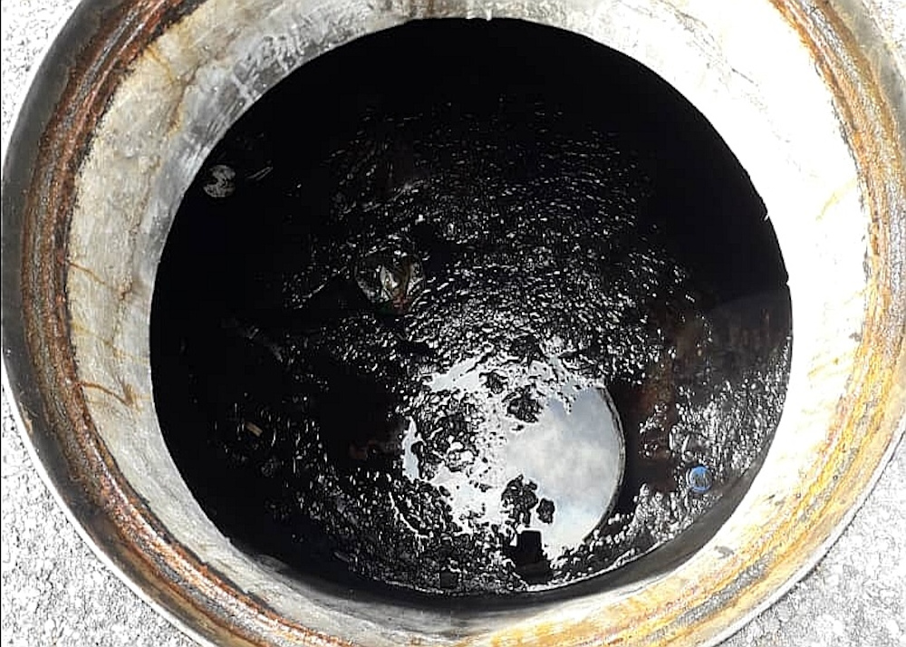 Waste that was illegally dumped into a manhole near the Bandar Bukit Mahkota IWK plant in Bangi December 23, 2019. u00e2u20acu201d Picture courtesy of SPAN