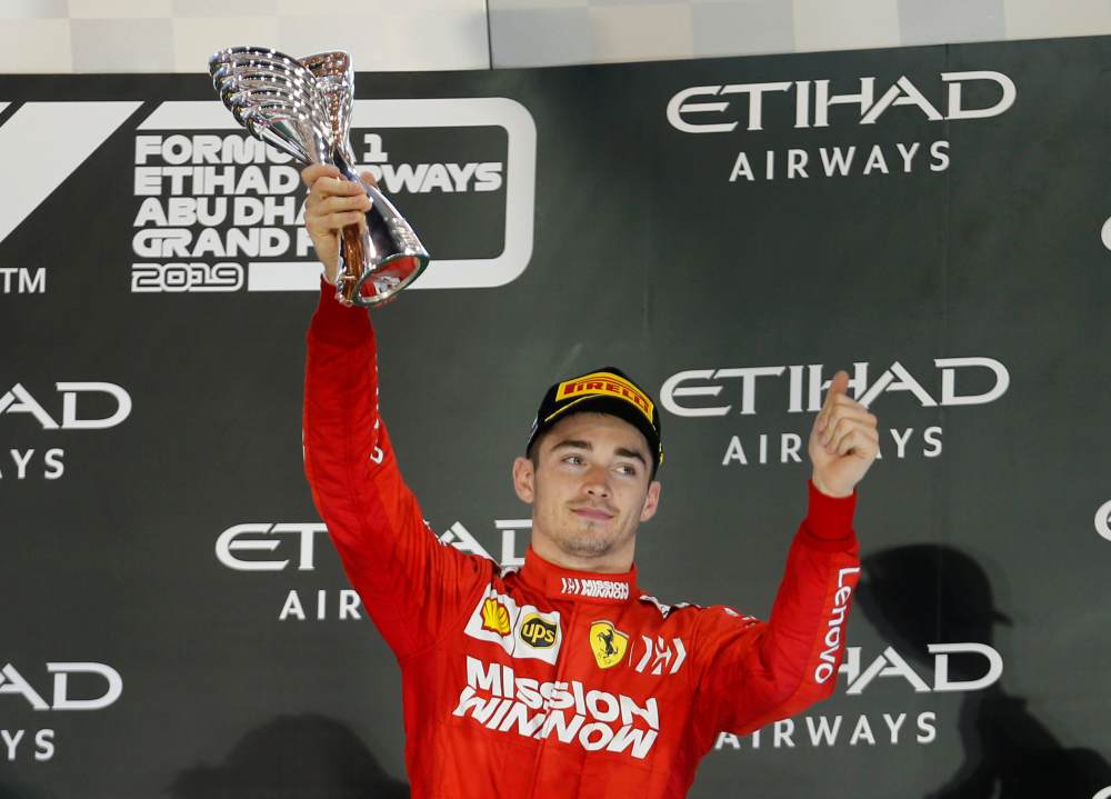 Ferrari's Charles Leclerc celebrates with the trophy after finishing third in Abu Dhabi December 1, 2019. u00e2u20acu2022 Reuters pic