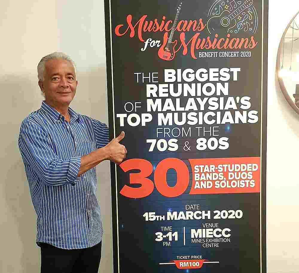 Persatuan Pemuzik Tempatan Selangor president and organising chairman Francis Danker with the Musicians for Musicians Benefit Concert poster. — Picture via Facebook/Musicians for Musicians Malaysia. 