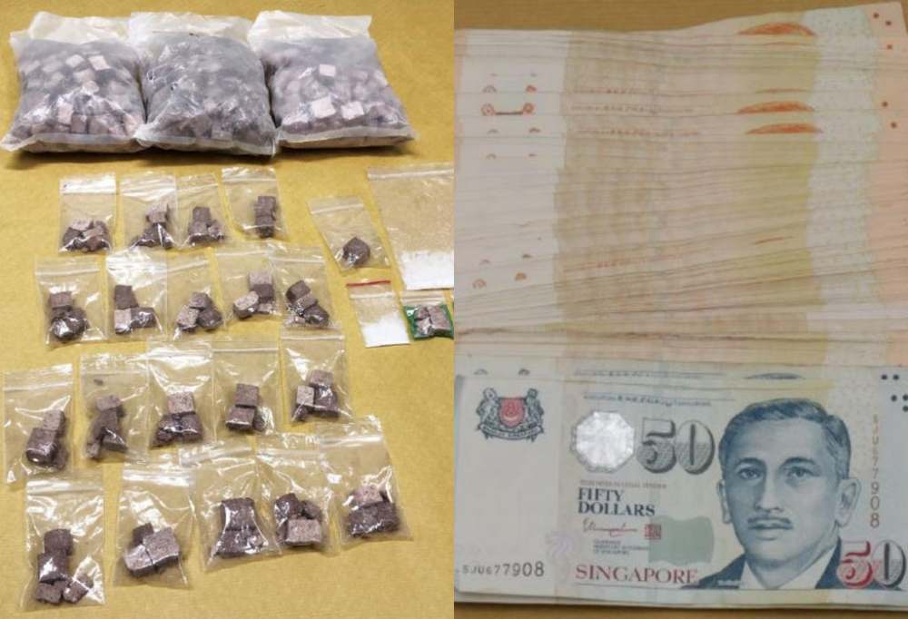 Officers from the Central Narcotics Bureau seized 1.58kg of heroin, along with other drugs, and cash worth S$11,000 in a raid in Woodlands. u00e2u20acu2022 Picture courtesy of Central Narcotics Bureau via TODAY