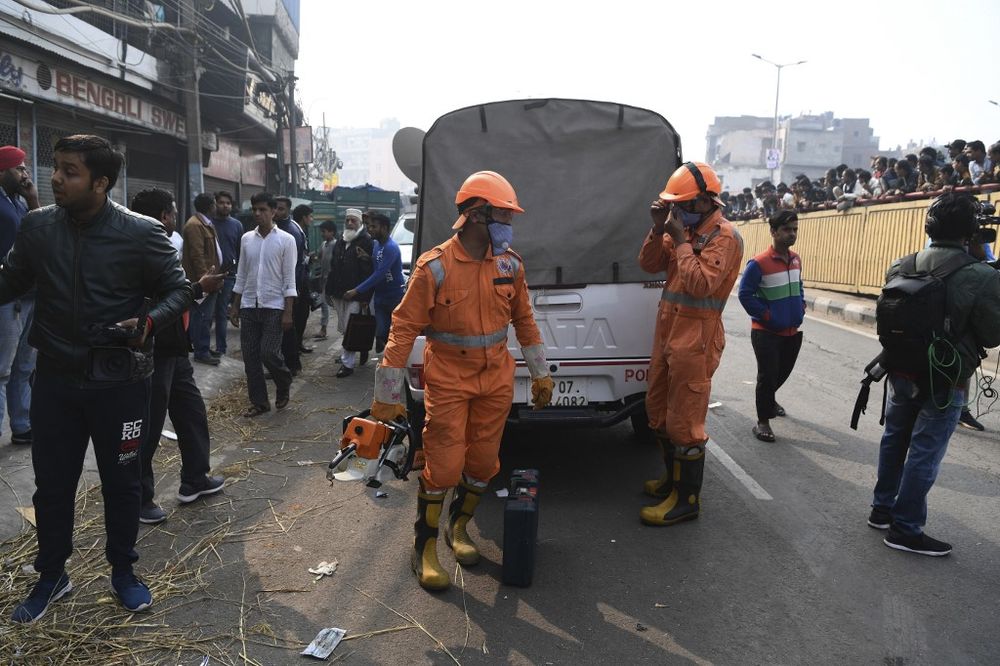 National Disaster Response Force personnel gear up as they prepare to access a factory site after a fire broke out, in Anaj Mandi area of New Delhi on December 8, 2019. u00e2u20acu201d AFP pic