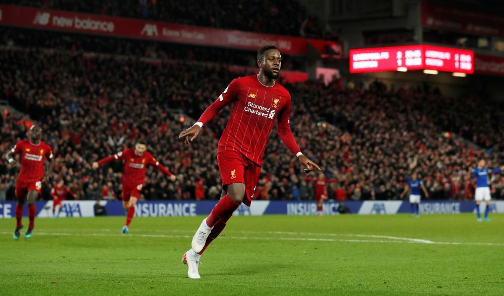 Liverpool's Divock Origi celebrates scoring their third goal against Everton. u00e2u20acu201d Reuters picnn